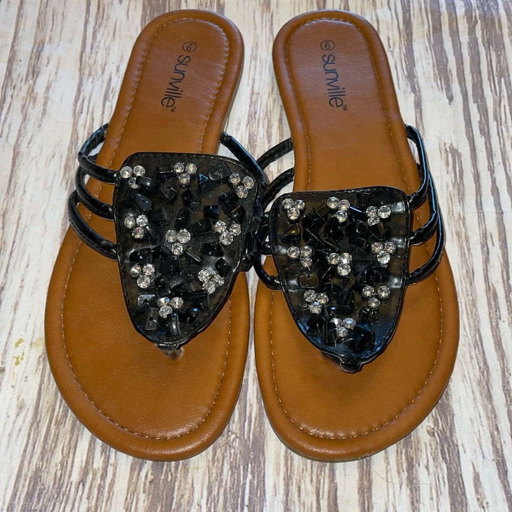 Sunville sandal used. Black with bling. Slight heel. Size 9